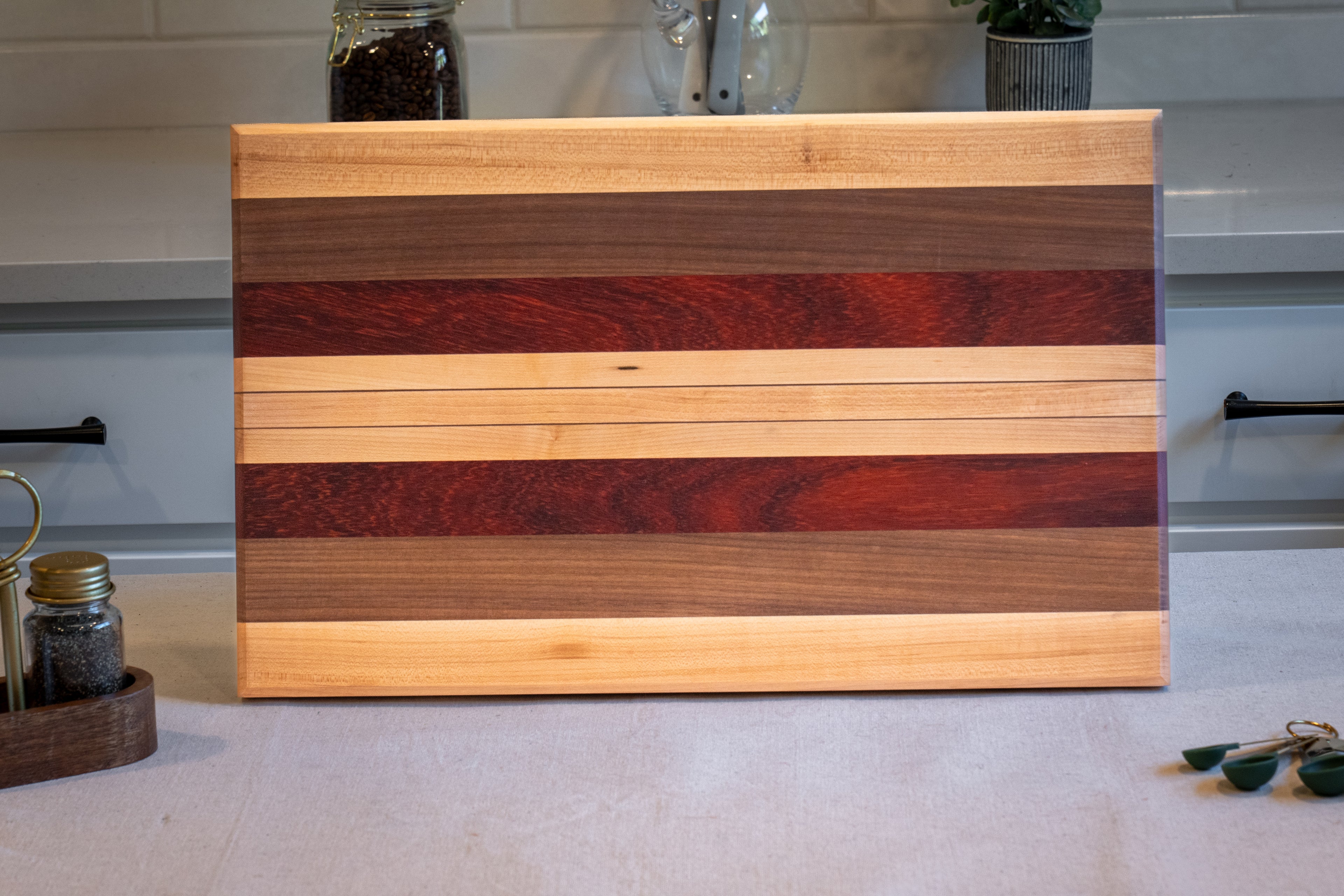 Walnut, Maple, Padauk Edge Grain Cutting Board