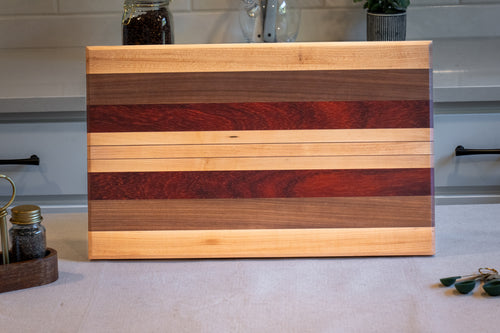 Walnut, Maple, Padauk Edge Grain Cutting Board