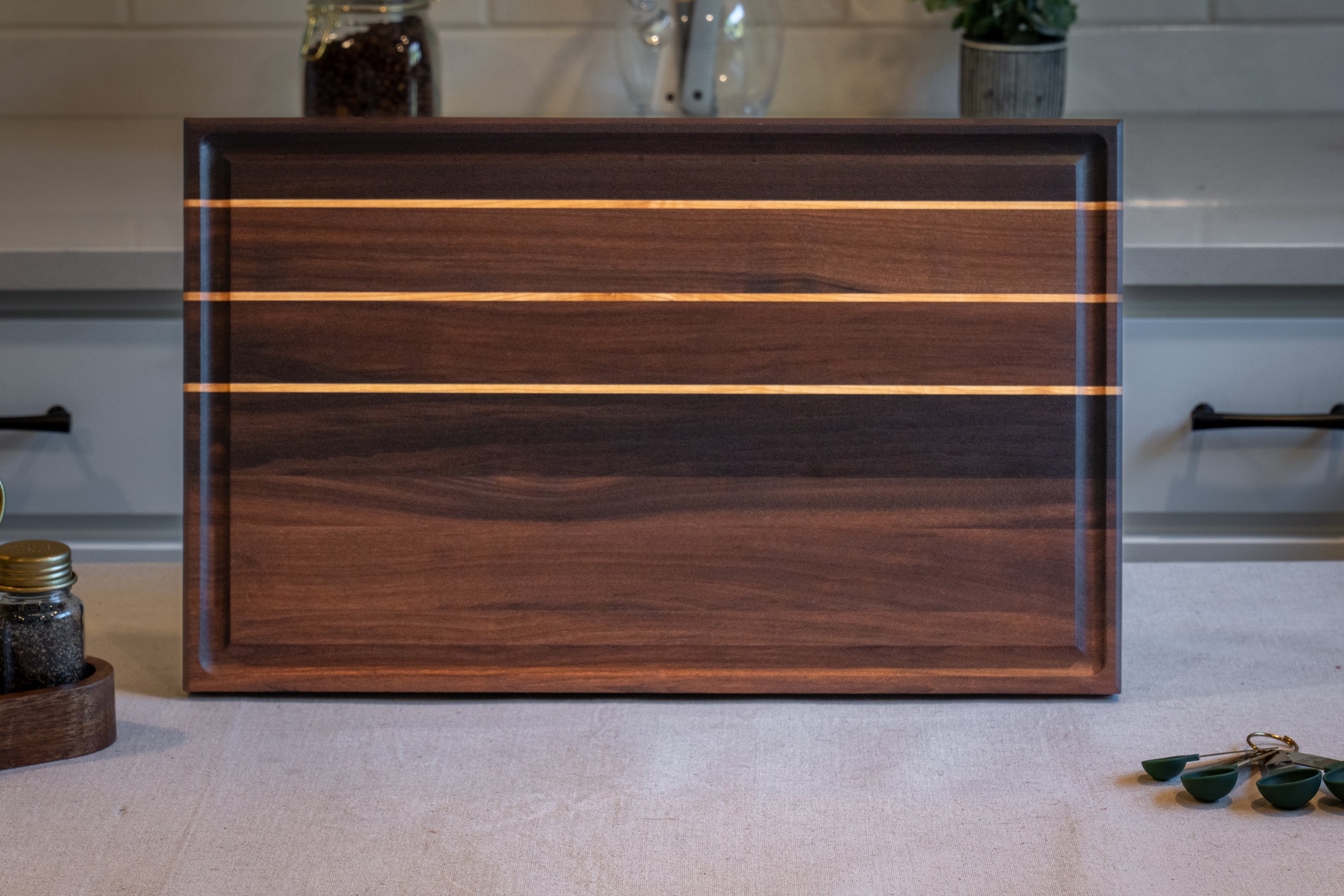 Walnut, Maple striped Edge Grain Cutting Board